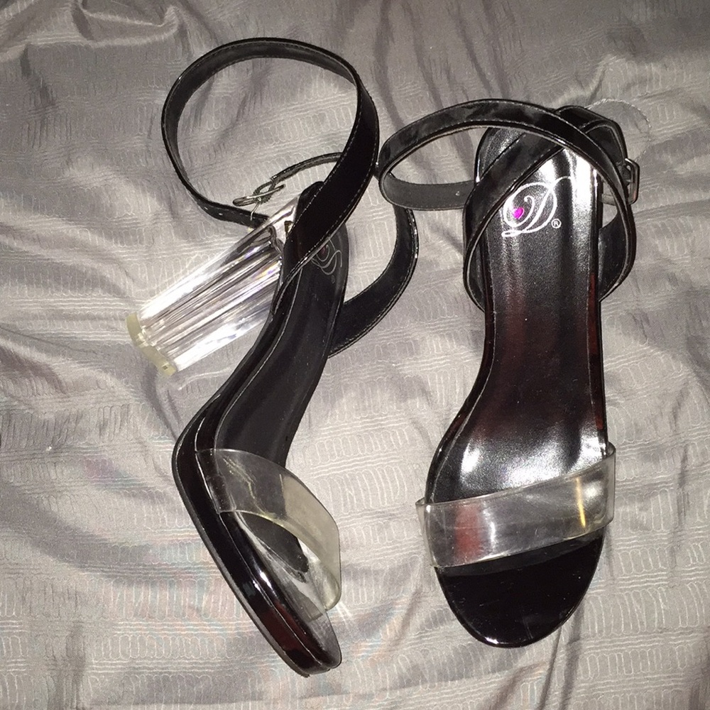 Clear and black heels